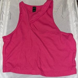 Hot pink assymterical cropped tank top.